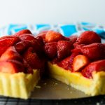 Ackee-pastry-cream-provides-a-sweet-and-unique-base-for-a-gorgeous-pile-of-fresh-strawberries-in-this-beautiful-summer-tart
