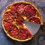 Bite-into-the-ultimate-umami-bomb-from-this-heirloom-tomato-and-ackee-tart,-baked-in-an-aged-cheddar-thyme-crust-it's-an-explosion-of-flavour-in-every-bite
