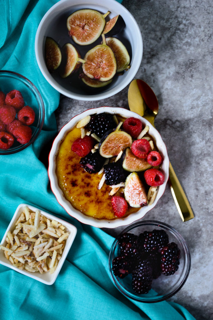 Figs-raspberries-blackberries-and-sugared-almonds-top-this-delicious-creamy-vegan-almond-ackee-creme-brulee,-6-ingredients-and-ready-in-about-an-hour-no-baking-required