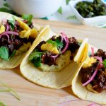 Oxtail-tacos-with-ackee-butter-bean-spread-roasted-poblano-and-quick-pickled-onions-and-ackee